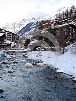 Old wooden chalet buildings in the swiss alpine village of zermatt