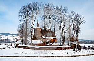 Old Wooden Church in Debno, Poland, in winter