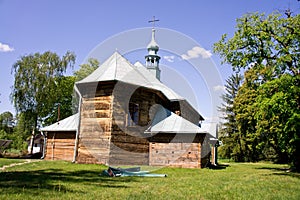 Old wooden church filmed on a bright sunny day