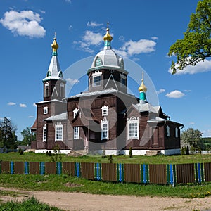 Old wooden Church of Saint George the Victorious in springtime, Slobodka village, Minsk region, Belarus