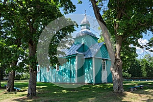 Old wooden Church of St Elijah in Belavichi village, Ivatsevichi district, Brest region, Belarus photo