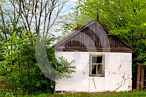 Old wooden clay house in an abandoned village