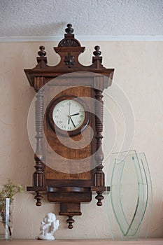 Old Wooden Clock on the Church Wall