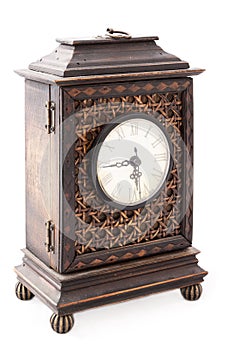 Old wooden clock isolated