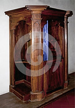 Old wooden confessional photo