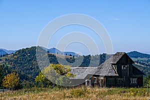 Old wooden country house on Tihuta pass, Transylvania, Romania