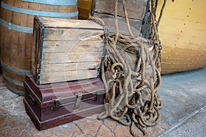 Old wooden crate on rusty metal chest for vintage decoration