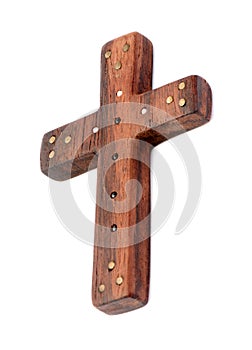 Old wooden cross decorated with beads