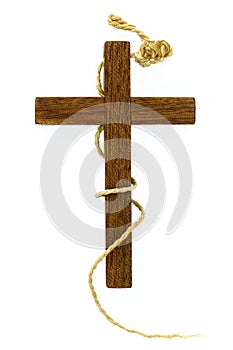 Old wooden cross with a rope turned around