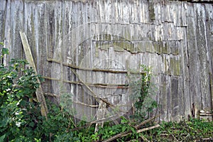 Old wooden derelict barn wall background