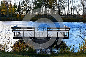 Old Wooden Dock on a Pond at Dusk