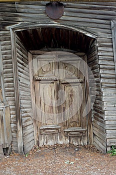 Old wooden door in an abandoned house.