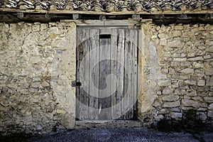 Old wooden door in an abandoned house