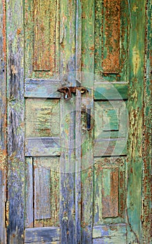 Old wooden door in abandoned house