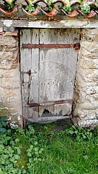 Old wooden door in ancestors house