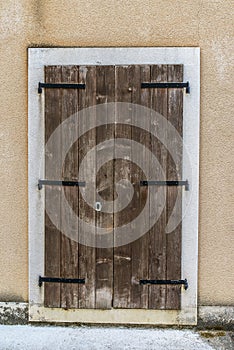 Old wooden door in ancient beautiful building