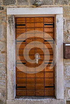 Old wooden door in ancient beautiful building