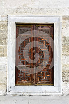 Old wooden door with Arabian pattern