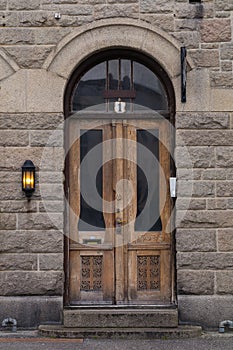 Old wooden door on an Art Nouveau style building