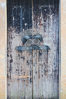 Old wooden door in the Chinese temple