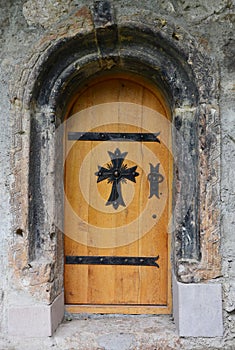 Old wooden door of a church