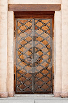 Old Wooden Door with Circle Iron Door Handle Knocker
