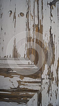 old wooden door covered in peeling paint