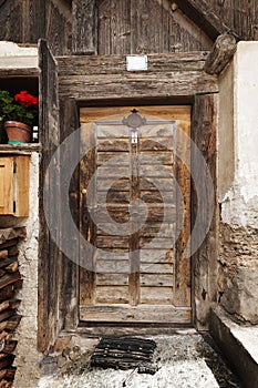 Old wooden door in D`ultimo