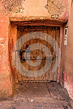 Old wooden door, the entrance to a house in Tiznit