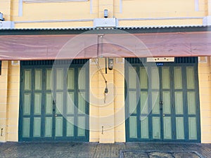 Old wooden door exterior of Thai house