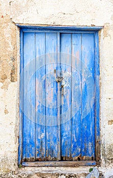 Old wooden door in a Greek village