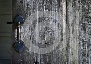 Old wooden door with handle