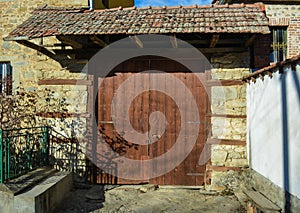 Old wooden door on a House in Prespa - Resen photo