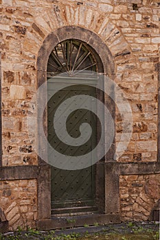 An old wooden door in medieval fortress