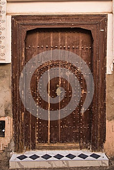 An old wooden door in the medina, Marrakech city, Morocco