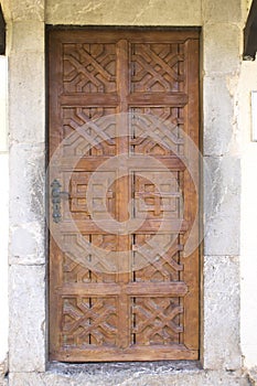 An old wooden door in an old monastery in Montenegro