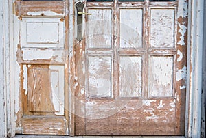 Old Wooden door peeling color texture rusty house background