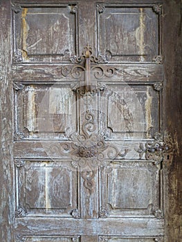 Old wooden door of the pilgrimage Church Maria Strassengel, a 14th century Gothic church in the town Judendorf Strassengel near