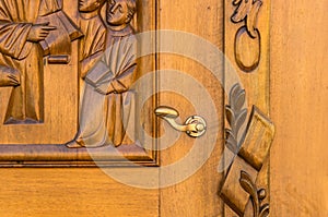 Old wooden door to the church in St. Gallen