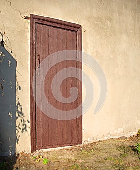 Old wooden door to a vintage dwelling