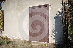 Old wooden door to a vintage dwelling