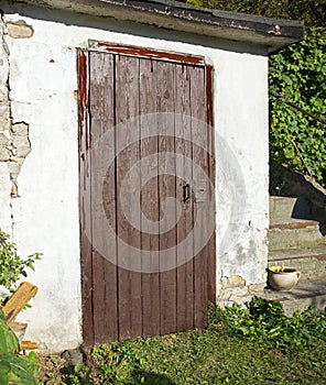 Old wooden door to a vintage dwelling