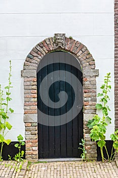 Old wooden door in Veere, Netherlands