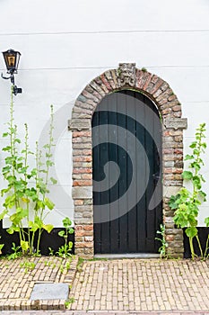 Old wooden door in Veere, Netherlands