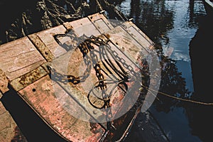 Old wooden doors chained in the water