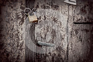 Old wooden doors padlocked closed