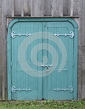 Old wooden double blue doors