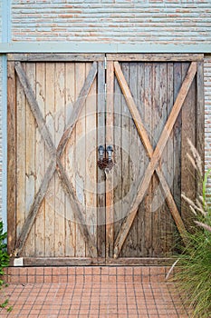 Old wooden double door was locked
