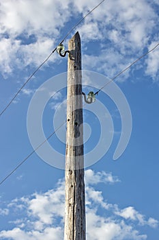 Old wooden electric pole