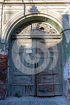 Old wooden entrance gate in Sibiu architecture, Romania